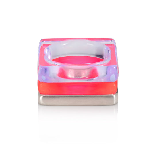 Set of square rings featuring (from bottom) thick silver, fluorescent pink, violet. BarbaraSpence.co.uk
