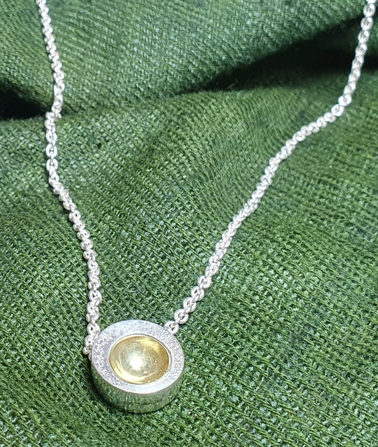 Orbit pendant, silver with gold cup. #BarbaraSpenceJewellery