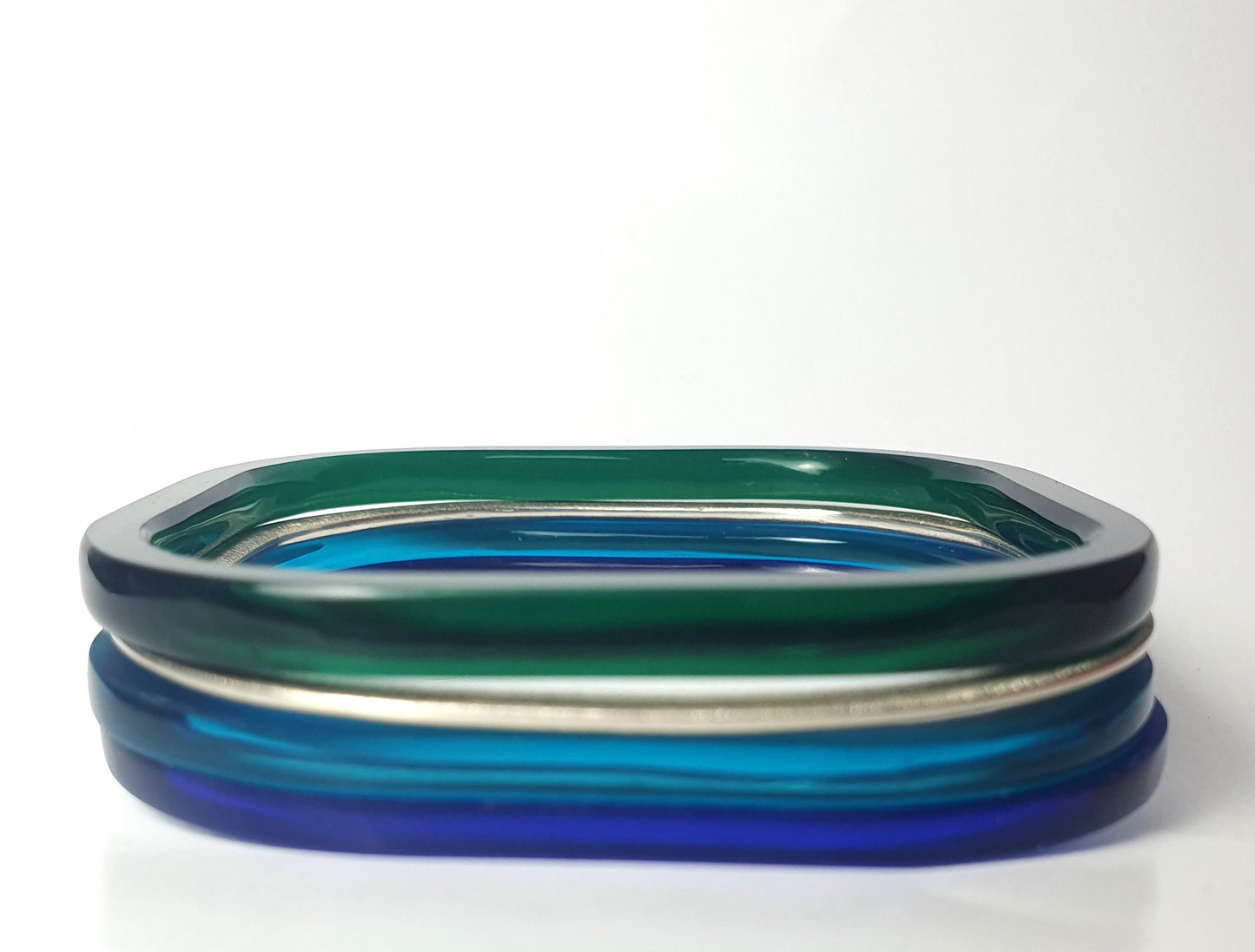 Set of square bangles in bottle green, azure and sapphire perspex with textured square silver bangle #BarbaraSpenceJewellery