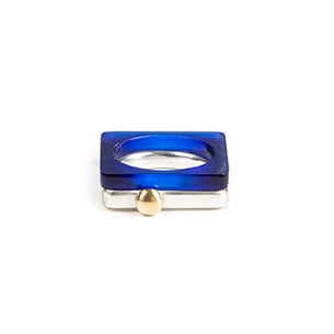 Square ring in deep blue sapphire perspex stacked with heavy square silver ring with gold ball www.barbaraspence.co.uk