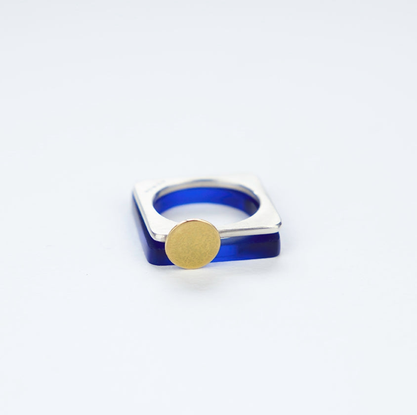Square ring in deep blue sapphire perspex stacked with square silver ring with gold moon www.barbaraspence.co.uk