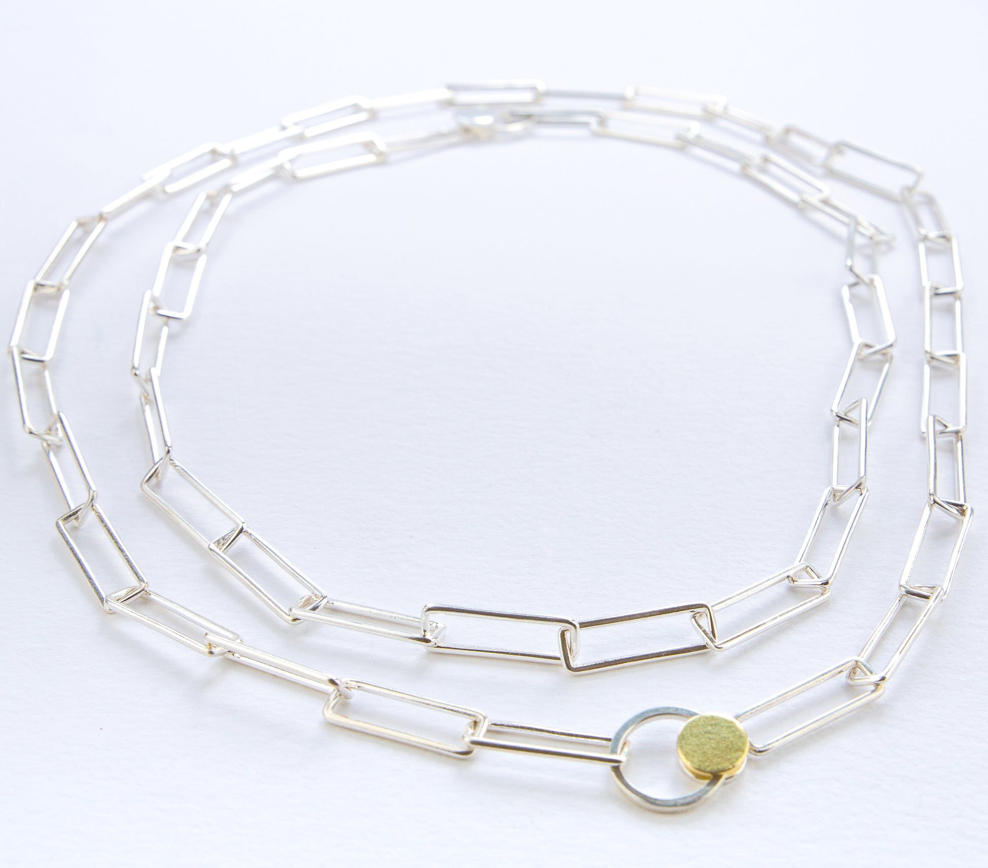 Orbit necklace with distinctive clasp in silver and gold www.barbaraspence.co.uk