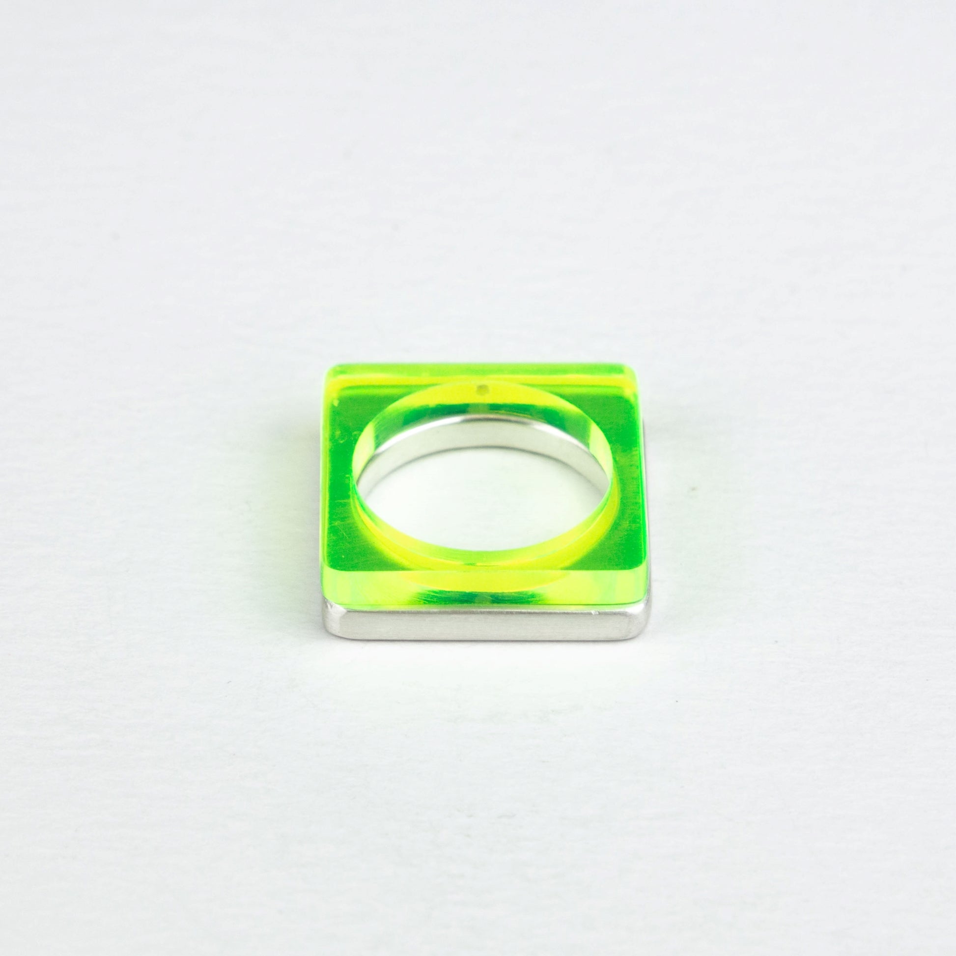 Modern square ring in heavy silver and acid green perspex ring www.barbaraspence.co.uk