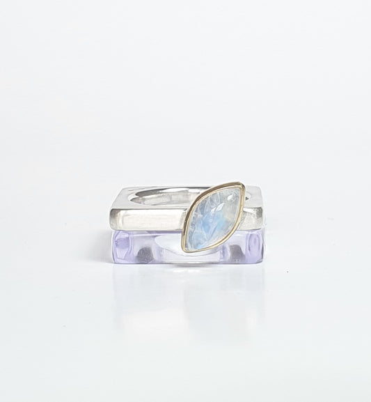 Violet perspex square stacking ring stacked with moonstone silver ring. barbara Spence Jewellery