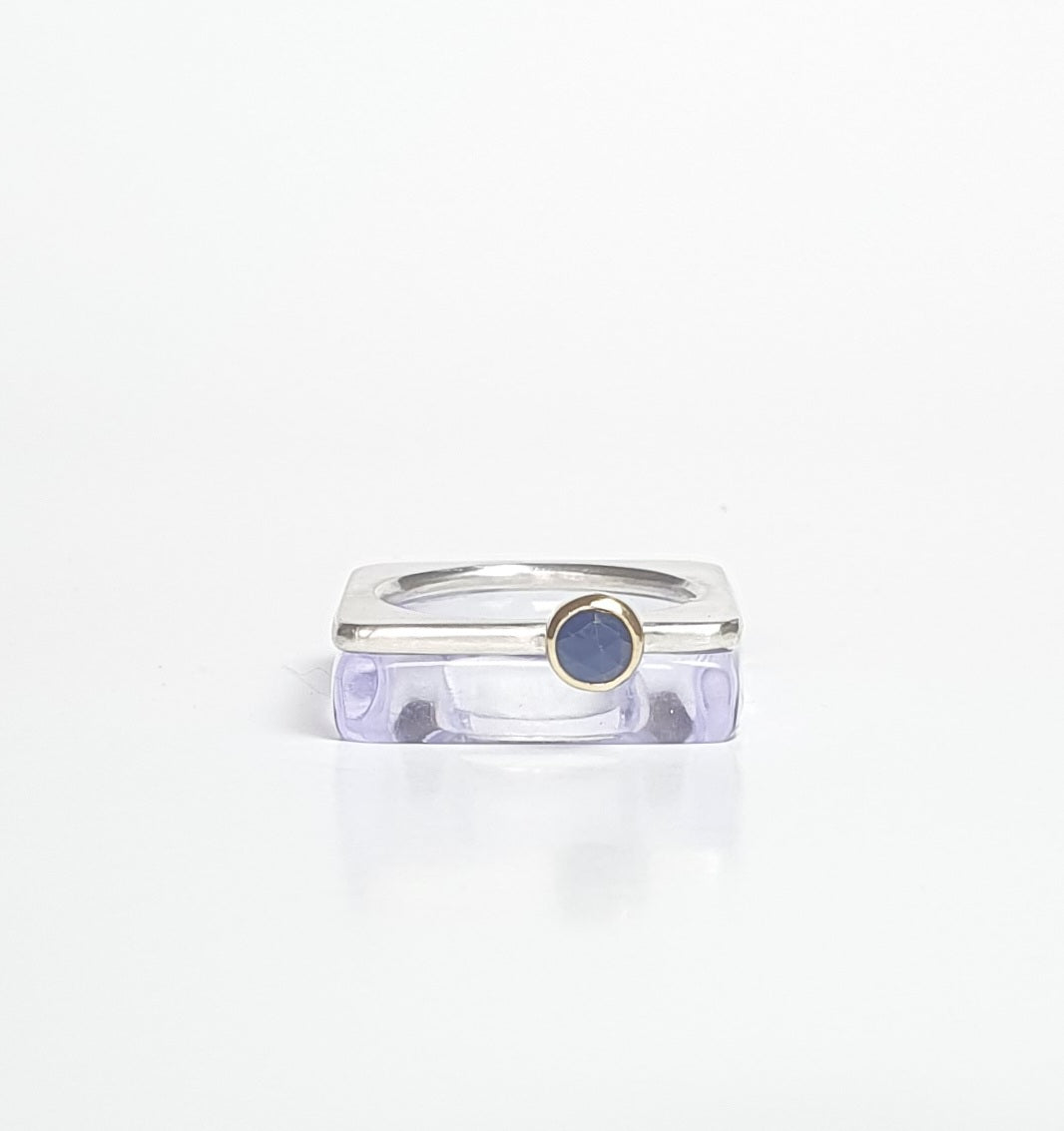 Violet perspex square stacking ring stacked with sapphire ring. barbara Spence Jewellery