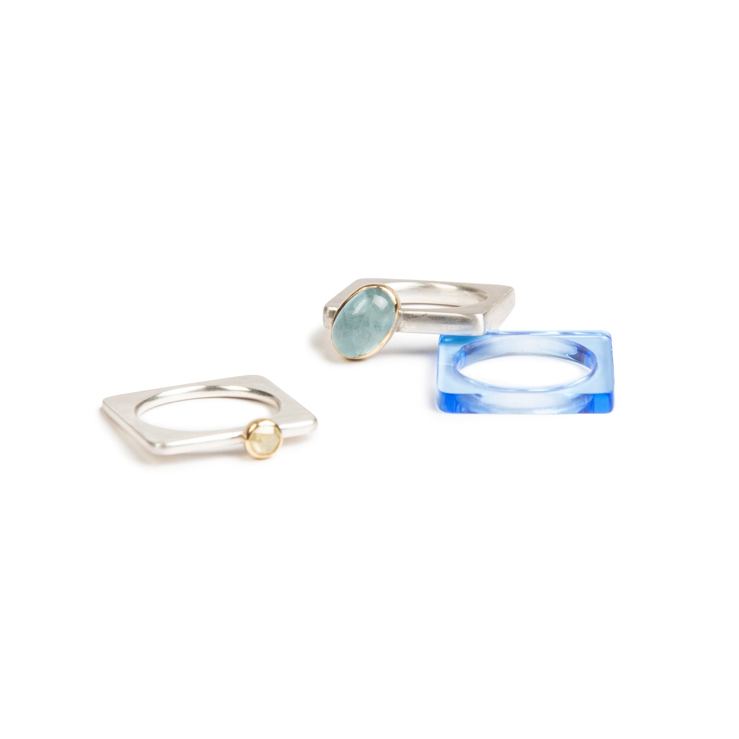 Thick silver ring with oval aquamarine and slim silver ring with diamond. Neptune perspex ring #barbaraspencejewellery