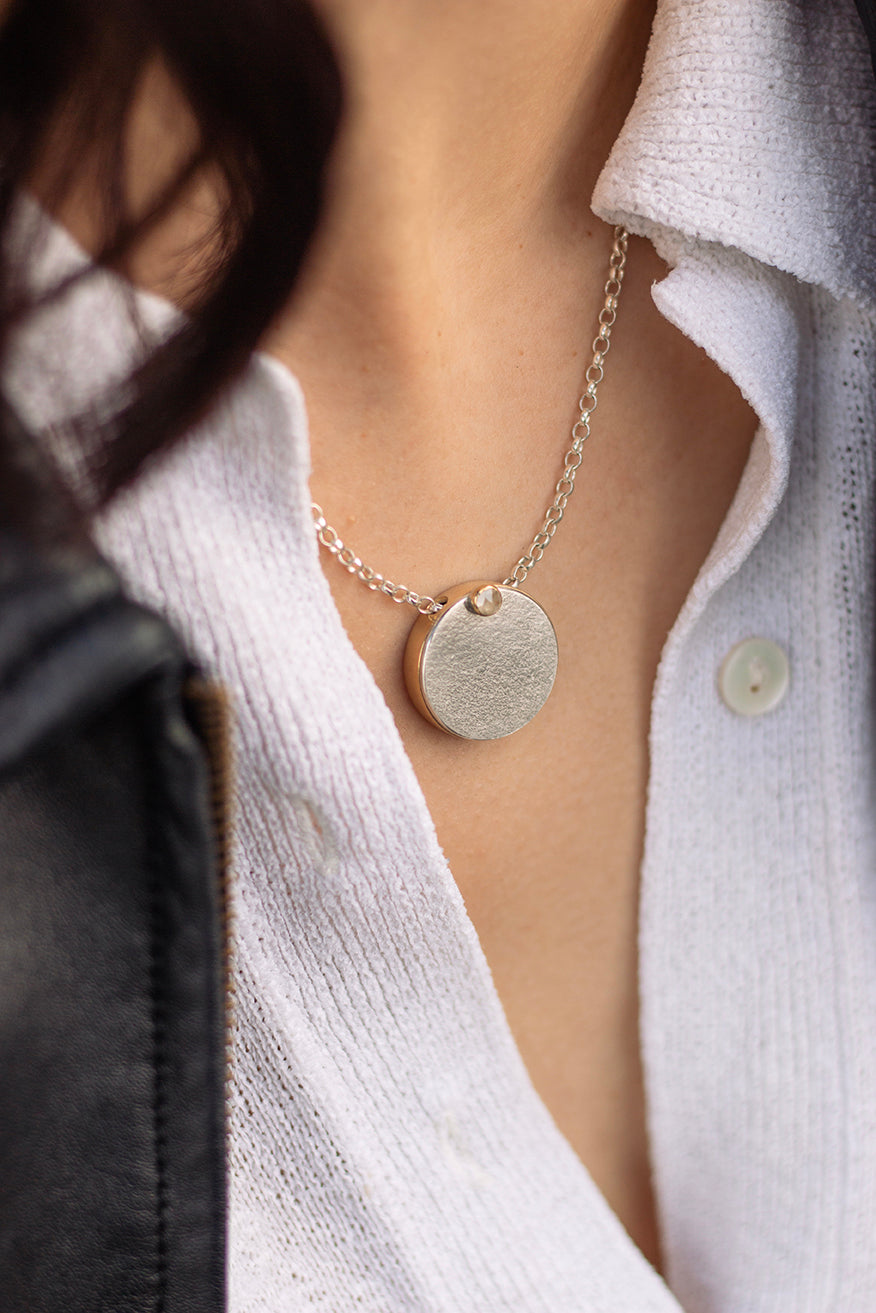 Midcentury moon locket in larger size on short chain