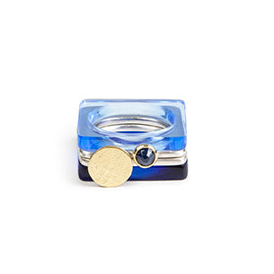 Pair of square silver rings featuring a rosecut sapphire and textured gold moon, with neptune and sapphire perspex rings #BarbaraSpenceJewellery