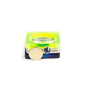 Pair of square silver rings featuring a rosecut sapphire and textured gold moon, with sapphire and acid green perspex rings #BarbaraSpenceJewellery