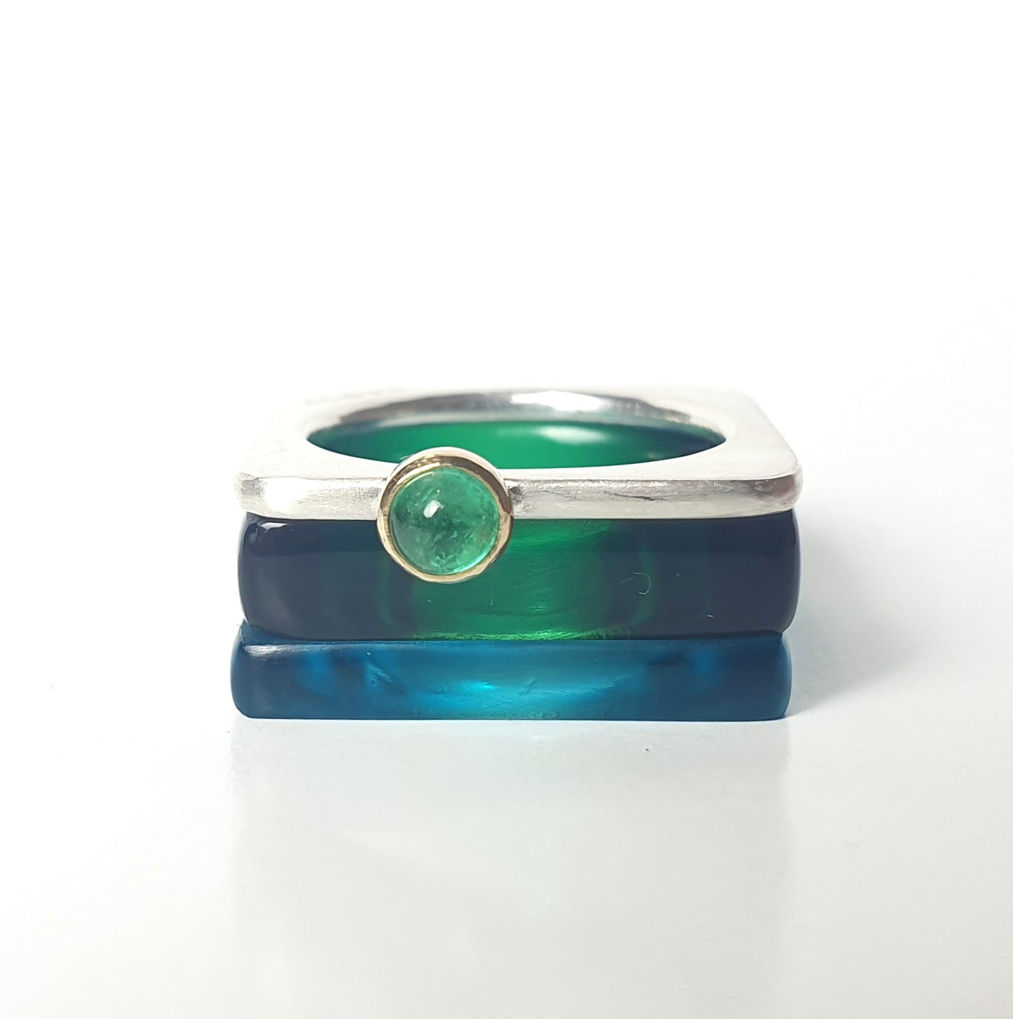 Two perspex rings in bottle green and azure with a silver ring decorated with an emerald (4mm)
#BarbaraSpenceJewellery