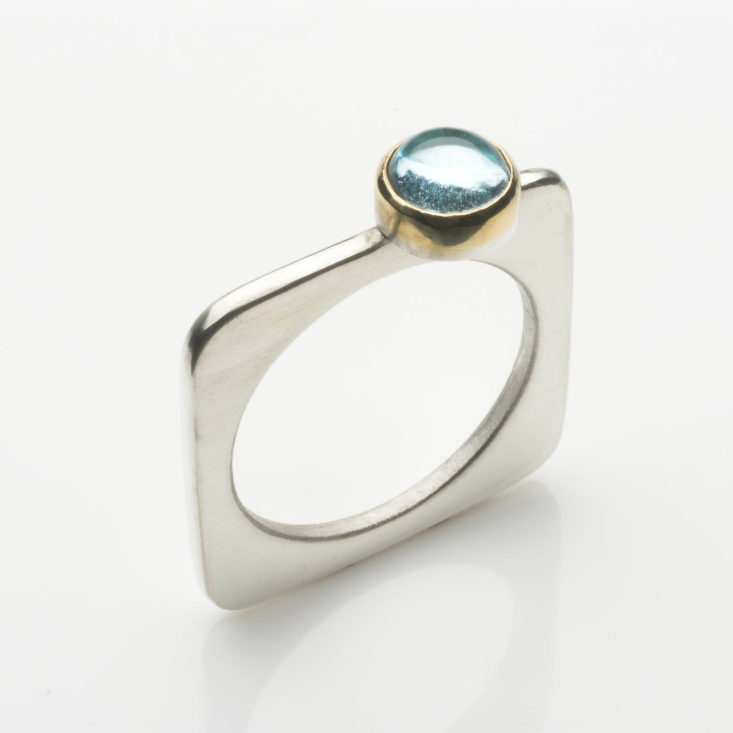 Square silver ring with pale blue topaz, 6mm