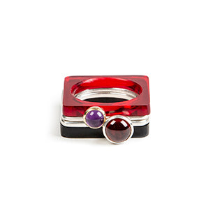 Square ring in dark red perspex.