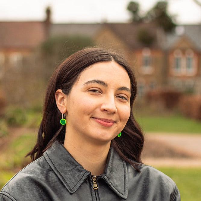 Acid green perspex earrings, modelled by Holly