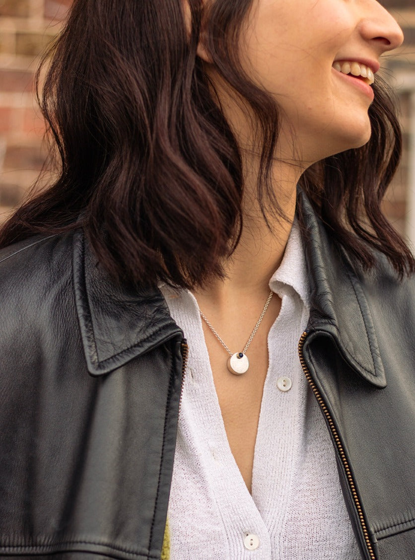 Midcentury moon locket with sapphire, modelled by Holly www.barbaraspence.co.uk