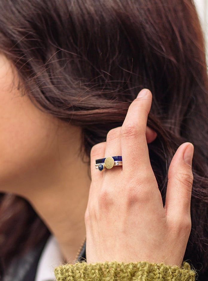 Set of square stacking rings: silver with rosecut sapphire and gold moon, and sapphire perspex, modelled by Holly www.barbaraspence.co.uk