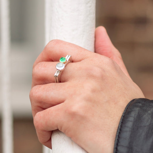 Square rings with emerald and topaz