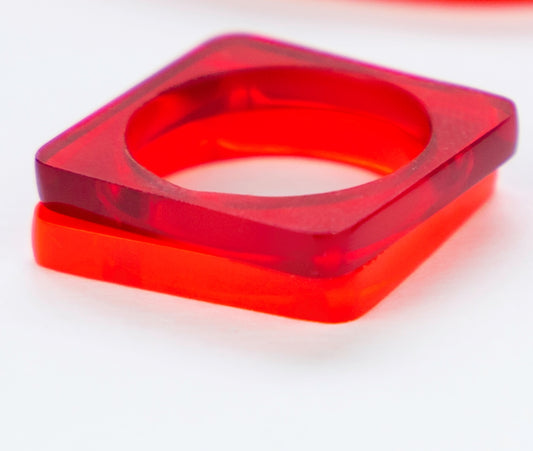 Square ring in fluorescent Mars and red perspex ring with dark red perspex ring www.barbaraspence.co.uk