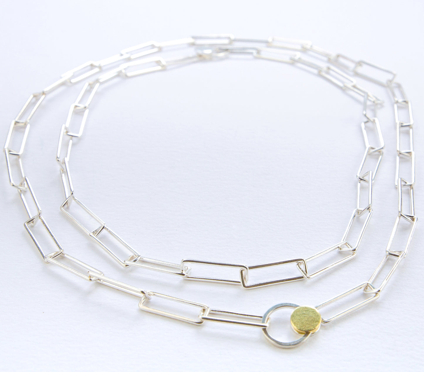Orbit necklace with distinctive clasp in silver and gold www.barbaraspence.co.uk