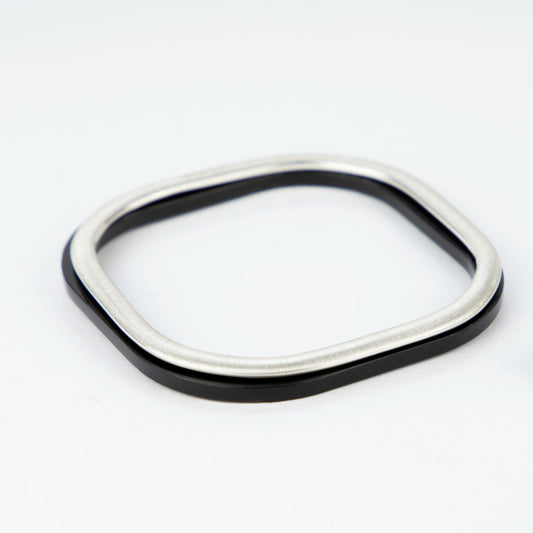 Square silver bangle with brushed texture stacked with black perspex bangleswww.barbaraspence.co.uk