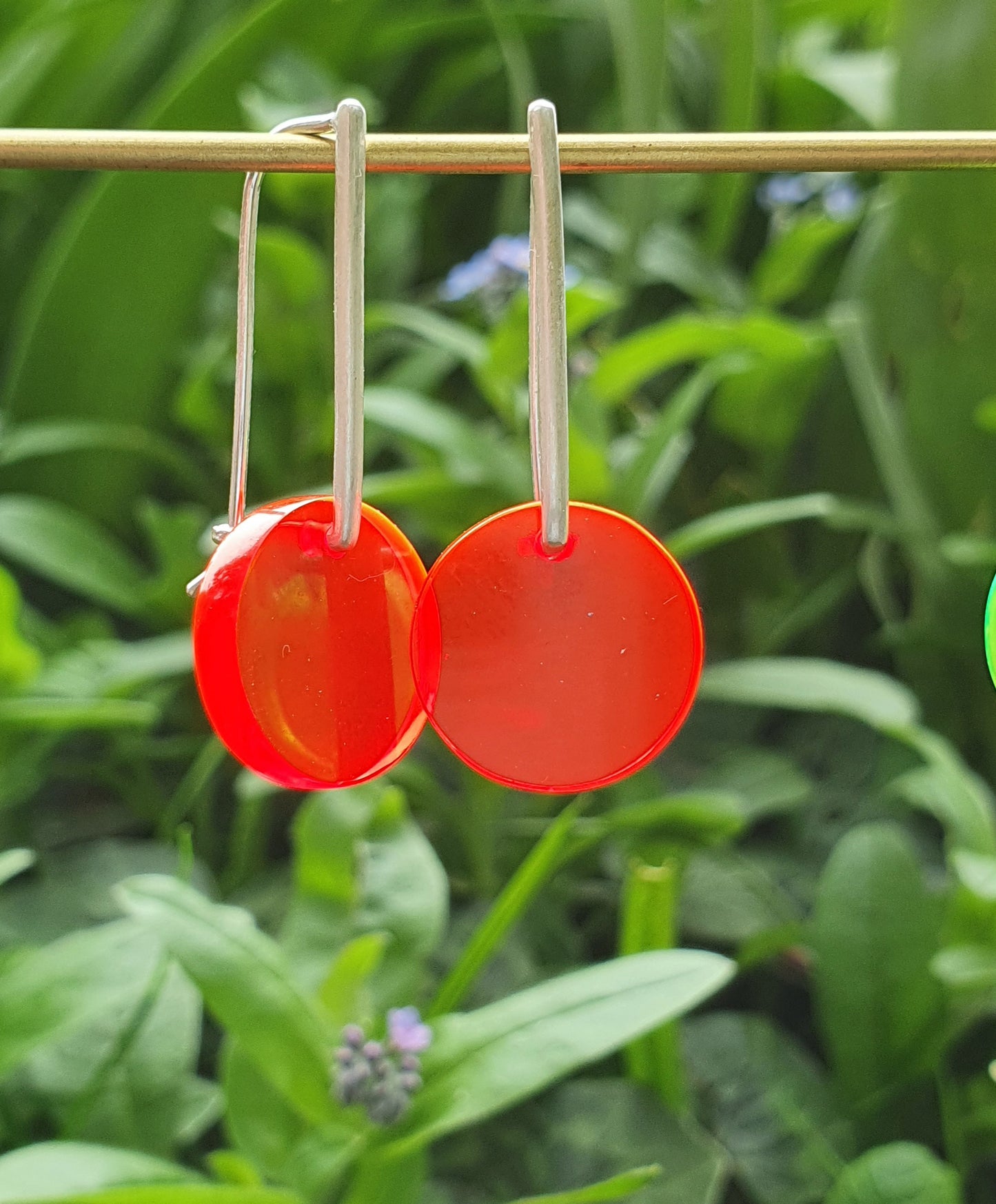 Perspex earrings in brightly coloured and fluorescent acrylic.