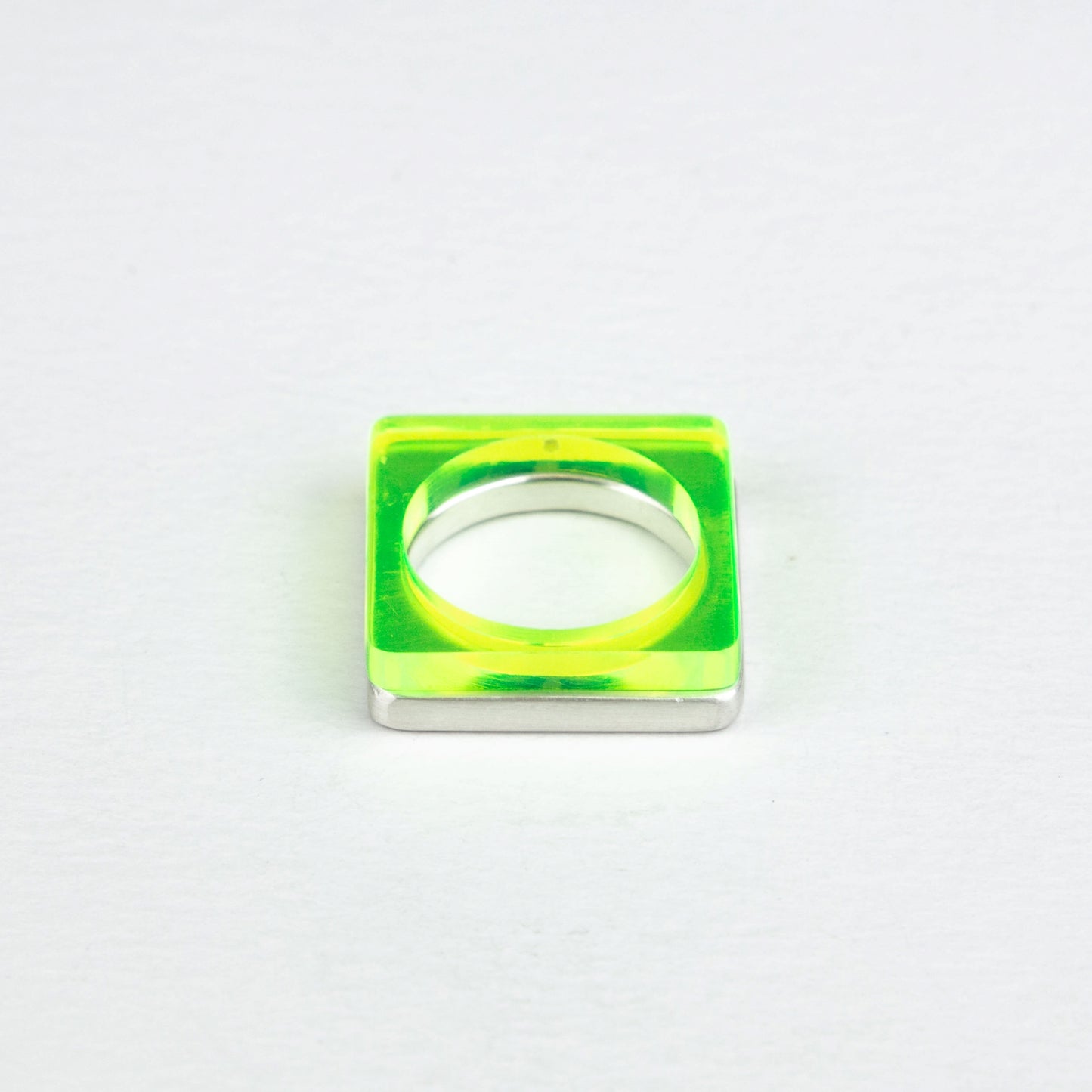 Modern square ring in heavy silver and acid green perspex ring www.barbaraspence.co.uk