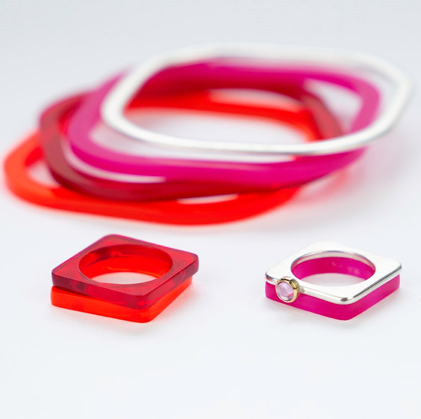 Square silver bangle with brushed texture stacked with red & pink bangles www.barbaraspence.co.uk